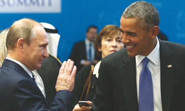 Vladimiras Putinas, Rusijos prezidentas, pabrėžė, kad yra pasirengęs bendradarbiauti su Vakarais, o šalies izoliacijos periodas esą baigėsi. „REUTERS“ / „SCANPIX“ NUOTR.