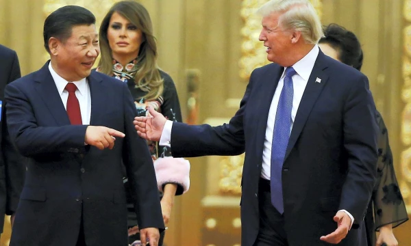 Donaldas Trumpas, JAV prezidentas, ir Xi Jinpingas, Kinijos vadovas. Thomaso Peterio (Reuters / Scanpix) nuotr.