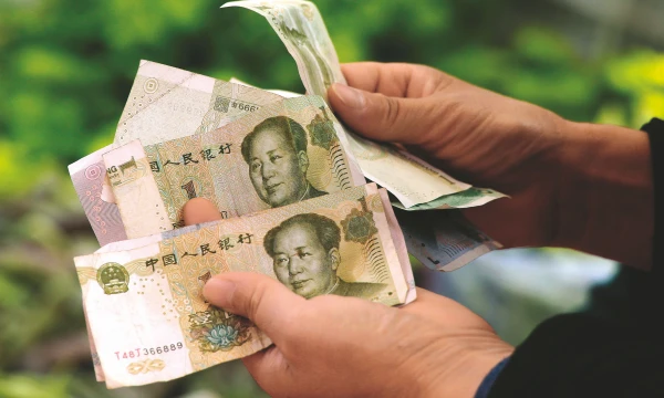 Didėjantis gyventojų skaičius Kinijoje verčia ieškoti apsirūpinimo maistu šaltinių ir investuoti milžiniškas sumas svetur.
Kim Kyung-HoonO („Reuters“ / „Scanpix“) nuotr.