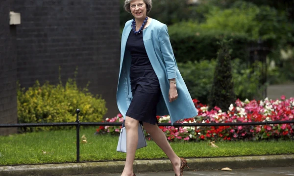  Theresa May, JK vidaus reikalų sekretorė, sutinka su tvirtinančiaisiais, kad, siekiant išvengti ilgalaikių neigiamų pasekmių britų ekonomikai, reikėtų neskubėti su „Brexit“ procesu.
Peterio Nichollso („Reuters“) nuotr. 