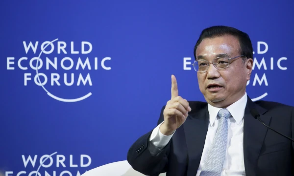 China's Premier Li Keqiang answers a question during a meeting with executives from foreign companies at the World Economic Forum (WEF) in China's port city Dalian September 9, 2015. Li said on Wednesday that the recent adjustment in the yuan was "very small" and that there is no basis for continued devaluation in the currency. REUTERS/Jason Lee