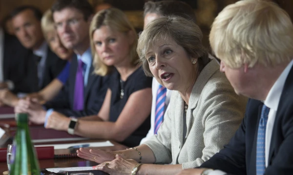 Theresa May, JK premjerė, nurodė, kad Didžioji Britanija ieškos savito pasitraukimo iš ES modelio. Stefano Rousseau („Reuters“ / „Scanpix“) nuotr.