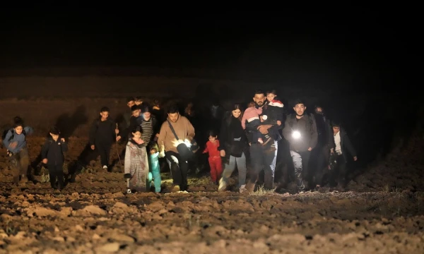 Migrantai Latvijos-Baltarusijos pasienio ruože. „Reuters“/Intso Kalninio nuotr.