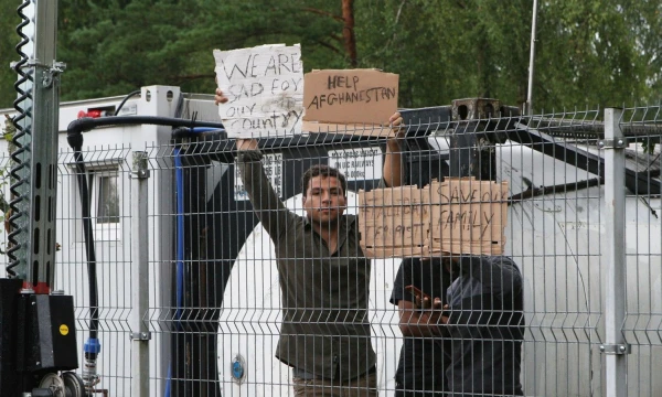 Migrantai Rūdninkų stovykloje. Darius Mataitis („Scanpix Baltics“) nuotr.