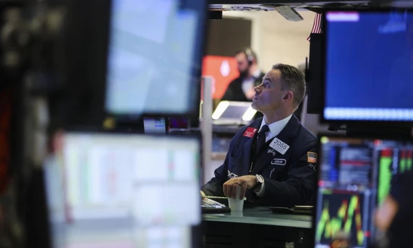 (180410) -- NEW YORK, April 10, 2018 (Xinhua) -- A trader works at the New York Stock Exchange in New York, the United States, on April 10, 2018. U.S. stocks closed higher on Tuesday. The Dow Jones Industrial Average gained 428.90 points, or 1.79 percent, to 24,408.00. The S&P 500 added 43.71 points, or 1.67 percent, to 2,656.87. The Nasdaq Composite Index was up 143.96 points, or 2.07 percent, to 7,094.30. (Xinhua/Wang Ying)  - Wang Ying -//CHINENOUVELLE_CnynysE000046_20180411_TPPFN0A001/Credit:CHINE NOUVELLE/SIPA/1804110900