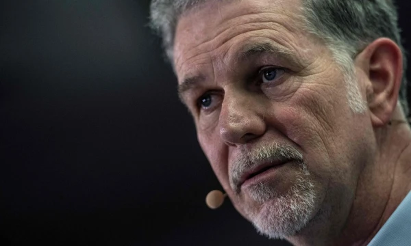 „Dievinu minties aiškumą ir tikslumą“, – sako Reedas Hastingsas. Milijardierius, „Netflix“ įkūrėjas, filantropas. Christophe Archambault (AFP / „Scanpix“) nuotr.