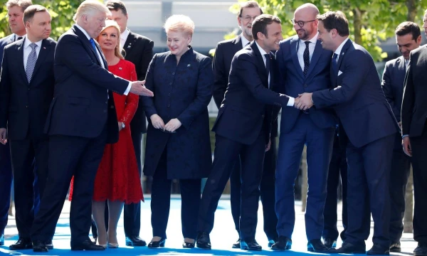 Dalia Grybauskaitė, Lietuvos prezidentė, ir Donaldas Trumpas, JAV vadovas, NATO viršūnių susitikime. Christiano Hartmanno (Reuters / Scanpix) nuotr.