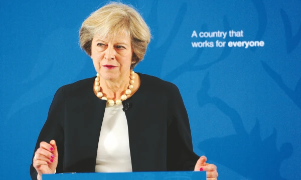 JK premjerė Theresa May. Nicko Ansellio („Reuters“ / „Scanpix“) nuotr.