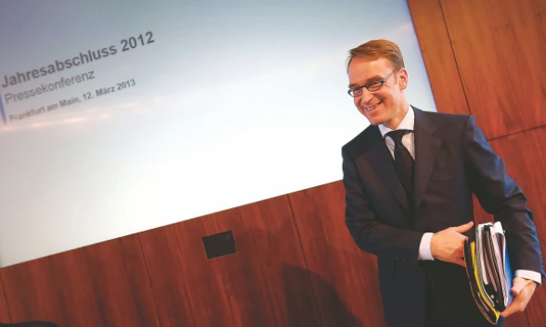 Jensas Weidmannas, Vokietijos centrinio banko vadovas, nepalaužiamas dėl šalies ekonomikos perspektyvų – jo teigimu, ūkis pajėgus atremti iškilusias grėsmes. Kai Pfaffenbacho („Reuters“ / „Scanpix“) nuotr.