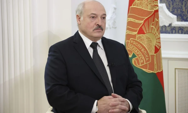 Belarusian President Aleksandr Lukashenko speaks during his interview with the Russian magazine of the Natsionalnaya Oborona (National Defense) in Minsk, Belarus, Tuesday, Nov. 9, 2021. (Nikolai Petrov/BelTA Pool Photo via AP)