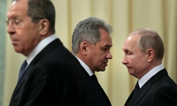 Iš kairės – S. Lavrovas, S. Šoigu, V. Putinas. AFP/„Scanpix“ nuotr.