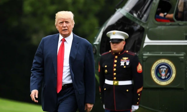 Donaldas Trumpas, JAV prezidentas, grįžo iš atostogų. Yin Bogu (Xinhua / Scanpix) nuotr.