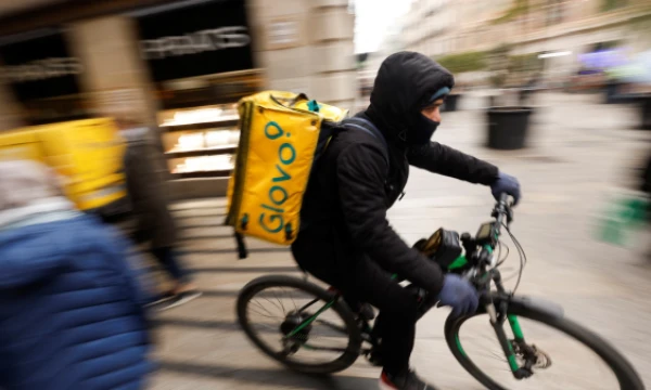 „Glovo“ kurjeris. „Reuters“ / „Scanpix“ nuotr. 