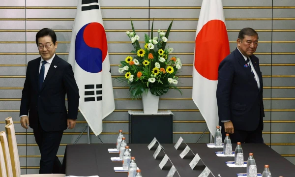Pietų Korėjos prezidentas Lee Jae Myungas ir Japonijos ministras pirmininkas Shigeru Ishiba. AP/Scanpix nuotr.